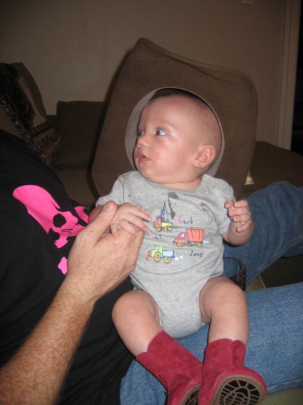 Owen with his cowboy hat and Justin boots